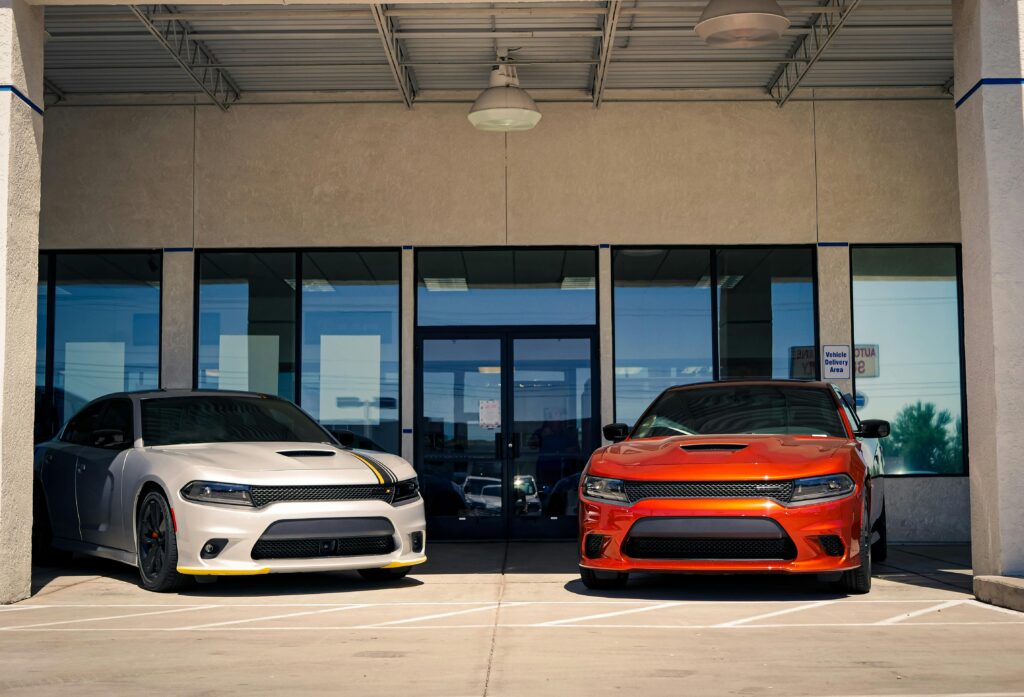 two cars in floor in red & white color